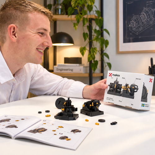 A person smiling while assembling the product